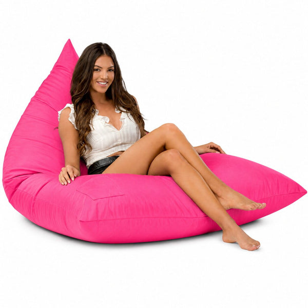 lady sitting on a pink bermuda triangle outdoor bean bag from bean bags r us