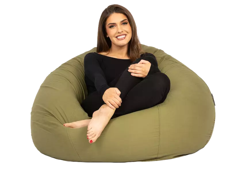 girl sitting on olive cotton beanbag