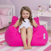 Young girl sitting on a pink bean bag chair in a child's bedroom.
