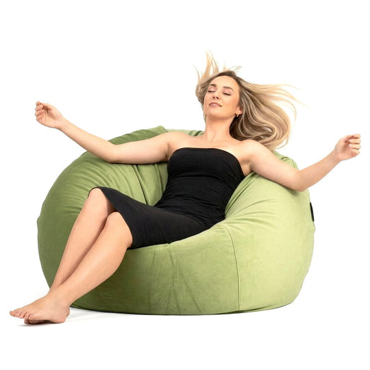bella velvet beanbag in sage green with lady posing