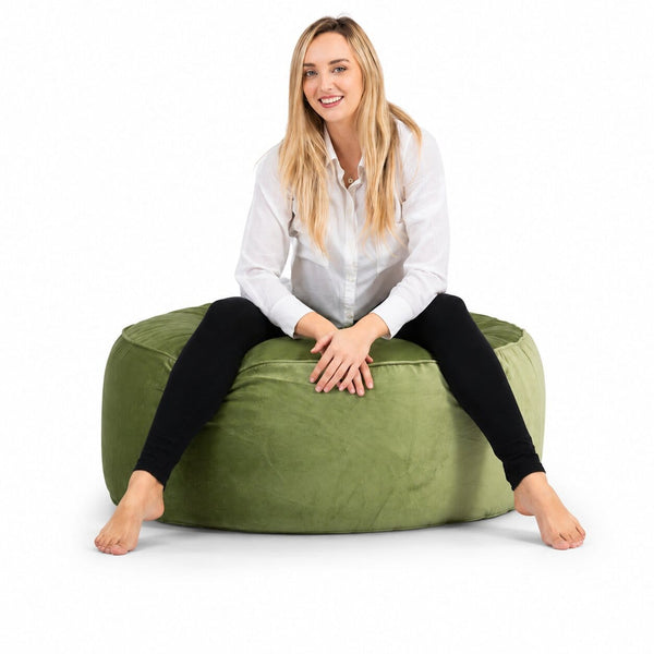 lady posing on a sage green velvet bean bag ottoman by bean bags r us — image 7