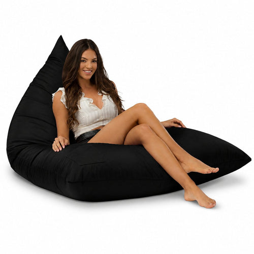 lady sitting on a black bermuda triangle outdoor bean bag from bean bags r us