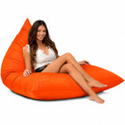 lady sitting on an orange  bermuda triangle outdoor bean bag from bean bags r us — thumbnail 4