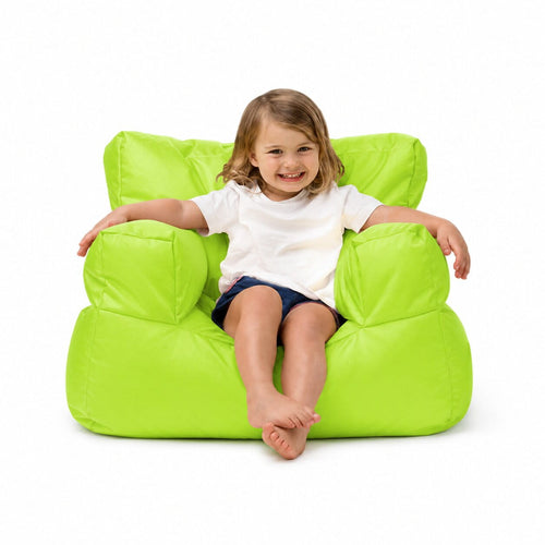 smiling young girl posing on a lime kids bean bag chair