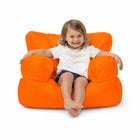 smiling young girl posing on an orange kids bean bag chair — thumbnail 13
