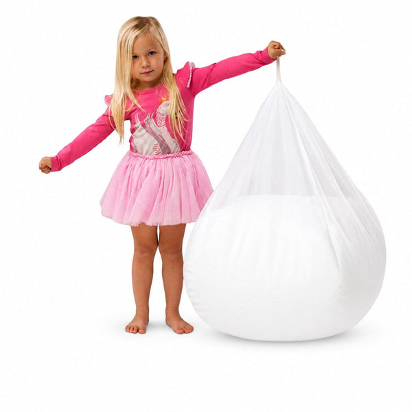 young girl holding an inner liner full of beanbag filling — image 8