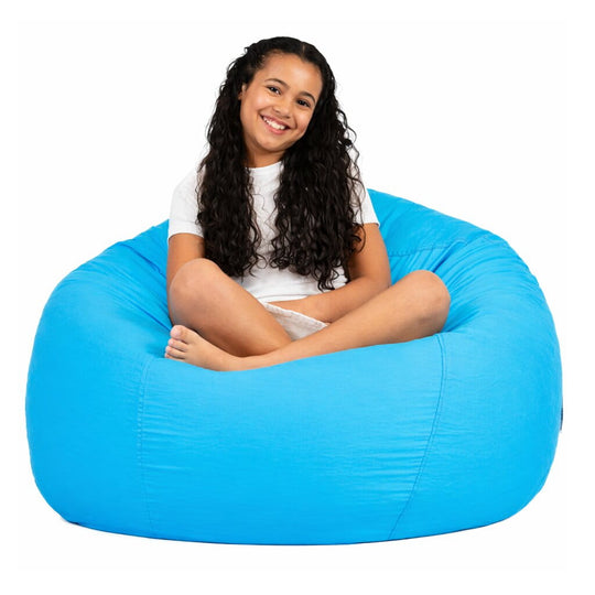 teenage girl sitting on a aqua blue cotton beanbag chair