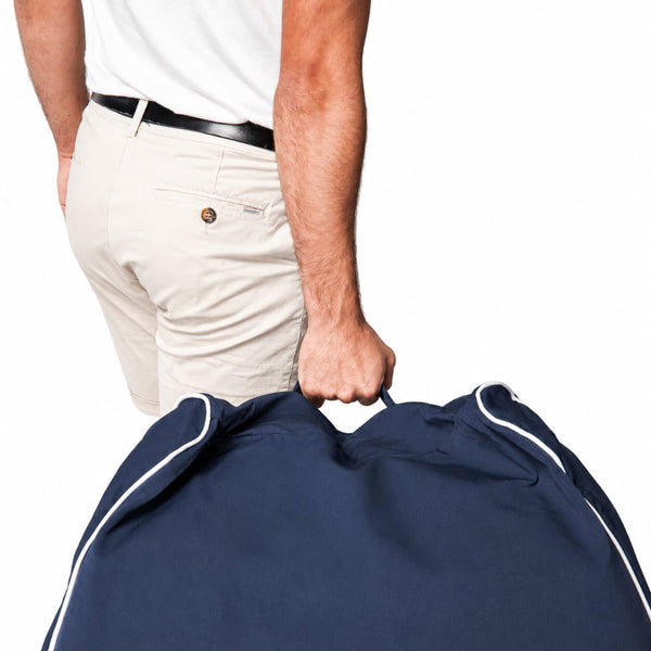 close up image of a copacabana bean bag chair handle with man holding it — image 6