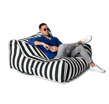 Costa Luxe Bean Bag Lounger black Stripes man posing