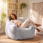 a lady sleeping on a foam filled sensory bean bag chair from bean bags r us — thumbnail 5