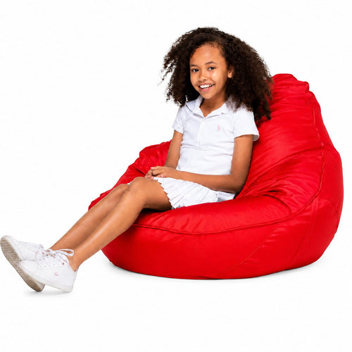 smiling teen girl sitting on a freaky cousin red bean bag chair