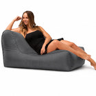 lady posing on a media lounge outdoor bean bag lounger in charcoal grey — thumbnail 1