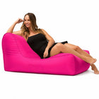 lady posing on a media lounge outdoor bean bag lounger in pink — thumbnail 4