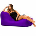 lady posing on a media lounge outdoor bean bag lounger in purple — thumbnail 5